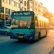 An intercity coach on an open road at golden hour
