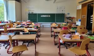 Bright classroom with rows of desks and chairs