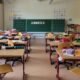 Bright classroom with rows of desks and chairs