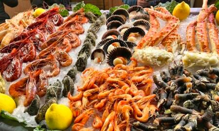 Table spread with a variety of freshly cooked seafood