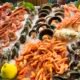 Table spread with a variety of freshly cooked seafood