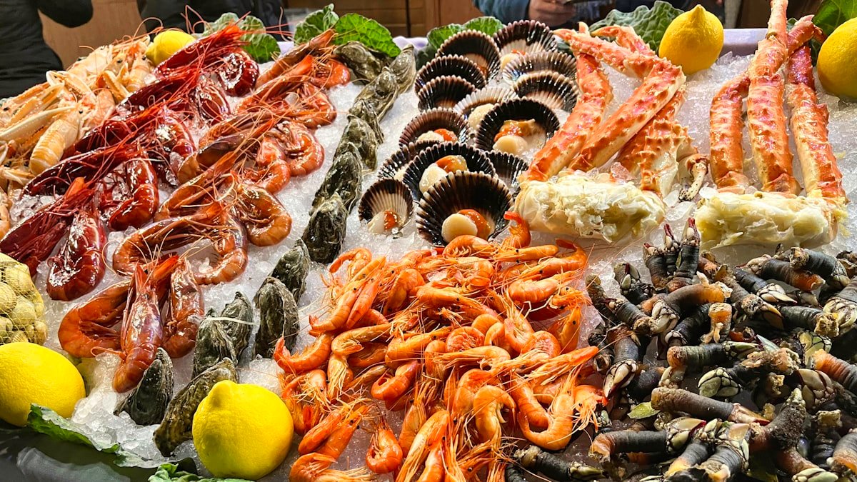 Table spread with a variety of freshly cooked seafood